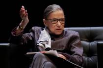 FILE - In this Oct. 21, 2019, file photo, U.S. Supreme Court Justice Ruth Bader Ginsburg gestur ...