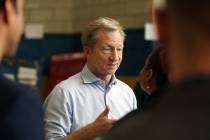 Presidential candidate Tom Steyer greets caucus participants at at Cheyenne High School in Nort ...