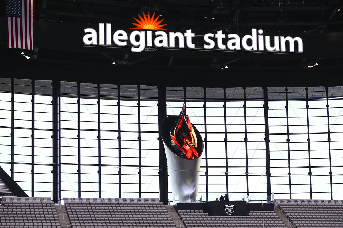 The Al Davis Memorial Torch is lit at the start of the Las Vegas Raiders home opening NFL game ...