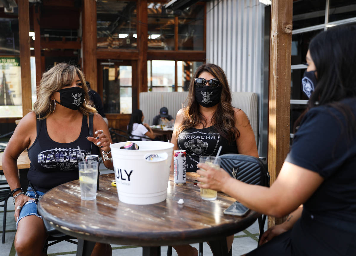 Rosemary Gonzales, left, hangs out with her friends Priscilla Romero, right, and Aleyx Duran, f ...