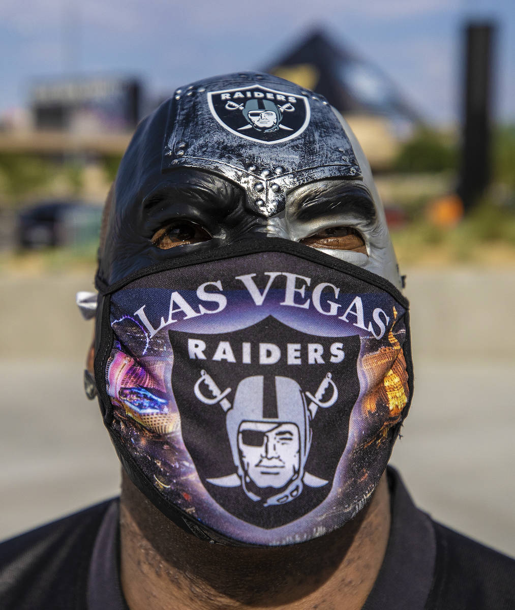 Vegas fan James Packer outside Allegiant Stadium before the start of an NFL football game betwe ...