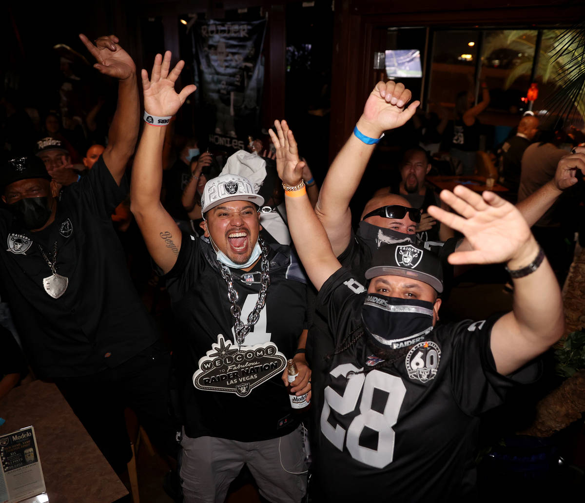 Steve "Raiders Steve" Trevilla of Whittier, Calif., from left, Nathaniel "Mayhem ...