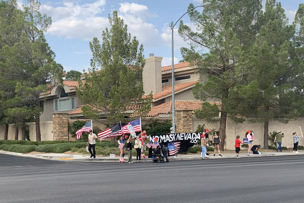 No Mask Nevada holds a rally near Gov. Steve Sisolak’s southwest Las Vegas home on Monday, Se ...