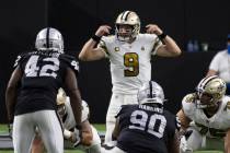 New Orleans Saints quarterback Drew Brees (9) directs traffic in the first quarter during an NF ...