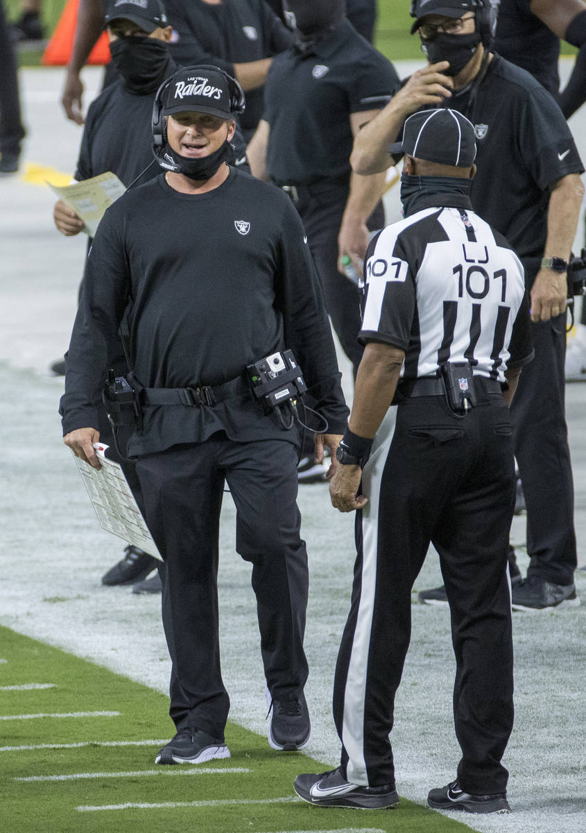 Las Vegas Raiders head coach Jon Gruden argues a call to the line judge during the first quarte ...