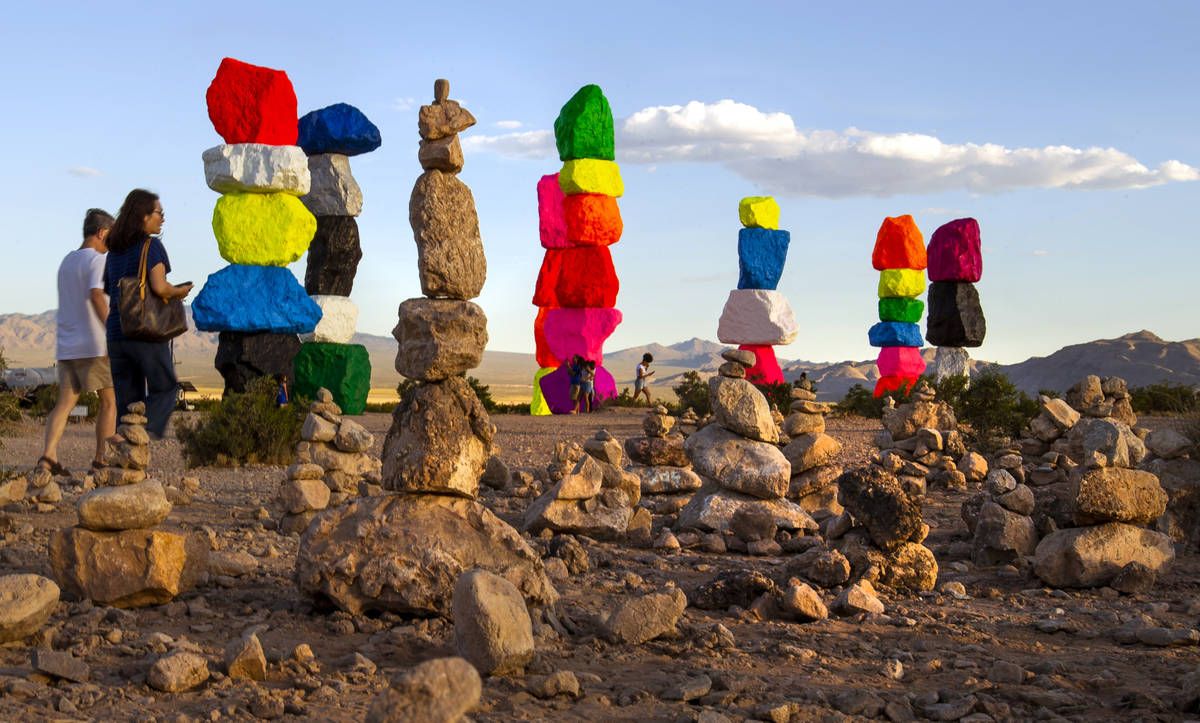 Rocks stacked by visitors mimic the Seven Magic Mountains near the newly renovated art installa ...