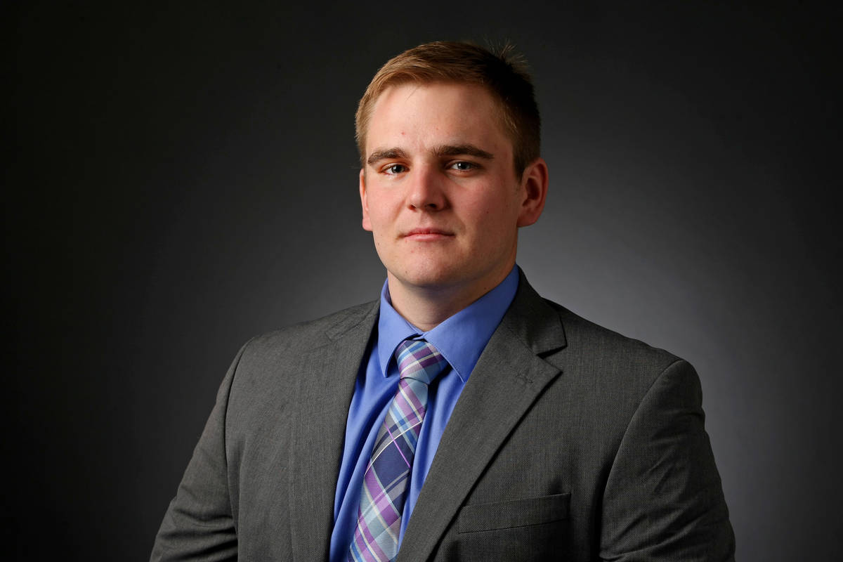 Michael Scott Davidson, reporter, poses for a portrait at the Las Vegas Review-Journal photos s ...