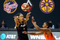 Las Vegas Aces center A'ja Wilson (22) passes the ball in front of Connecticut Sun forward Alys ...