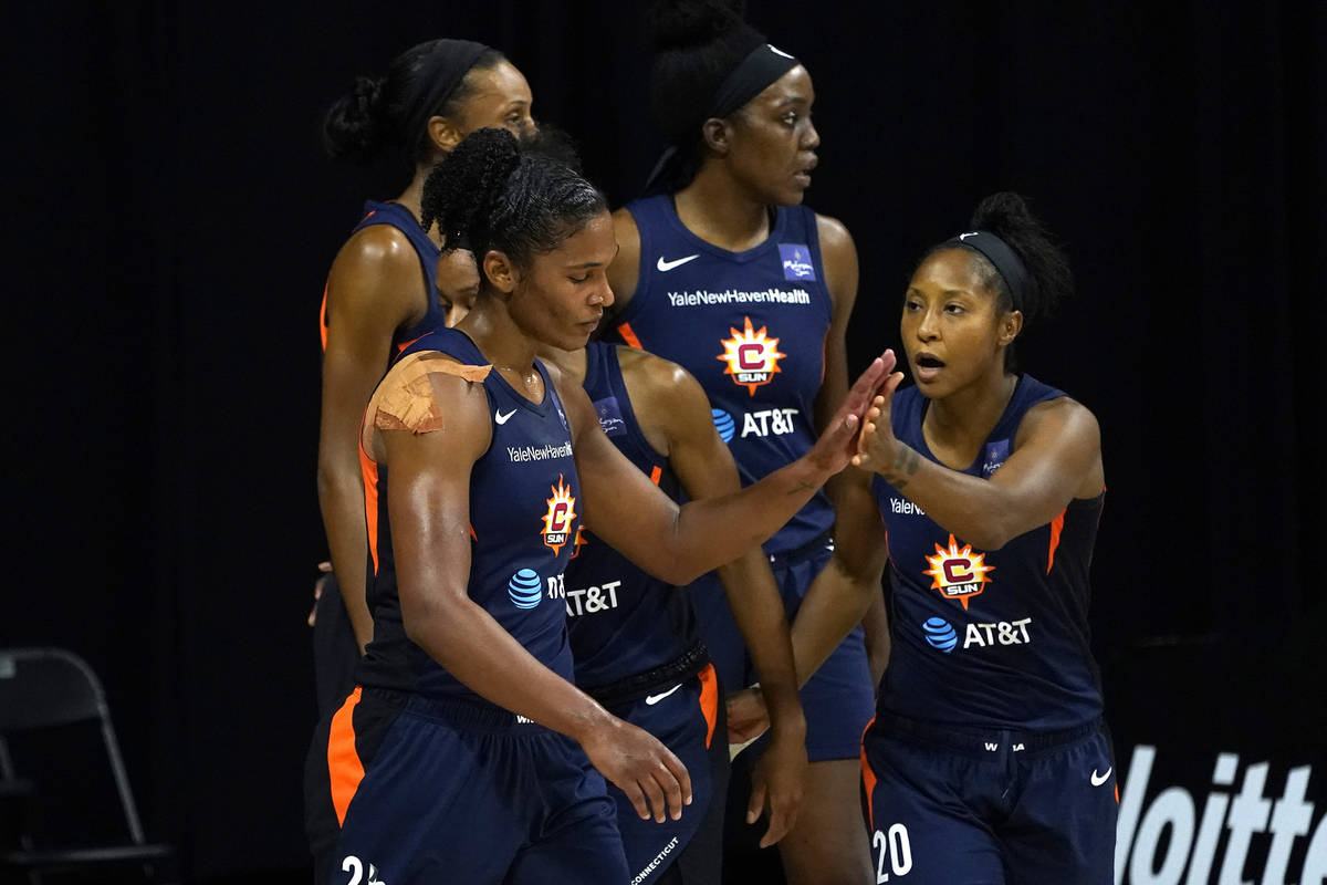 Connecticut Sun forward Alyssa Thomas (25) celebrates a basket against the Las Vegas Aces with ...