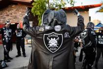 Raiders Squid shows off his jacket at a Raiders party at Tommy Rockers in Las Vegas, Sunday, Se ...