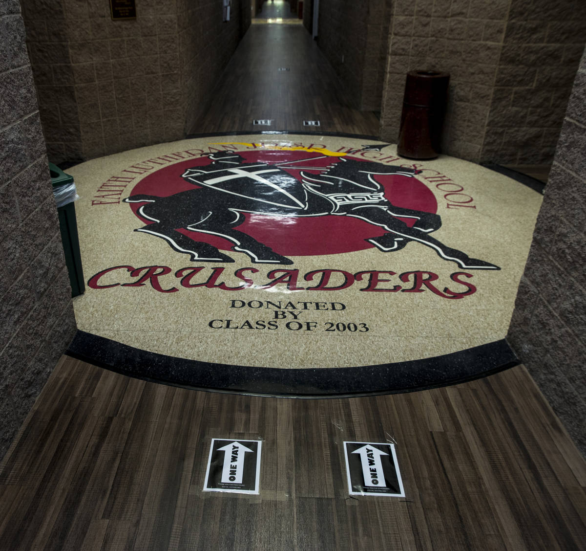 One way signs mark directions for flow at the Faith Lutheran Middle School & High School on ...