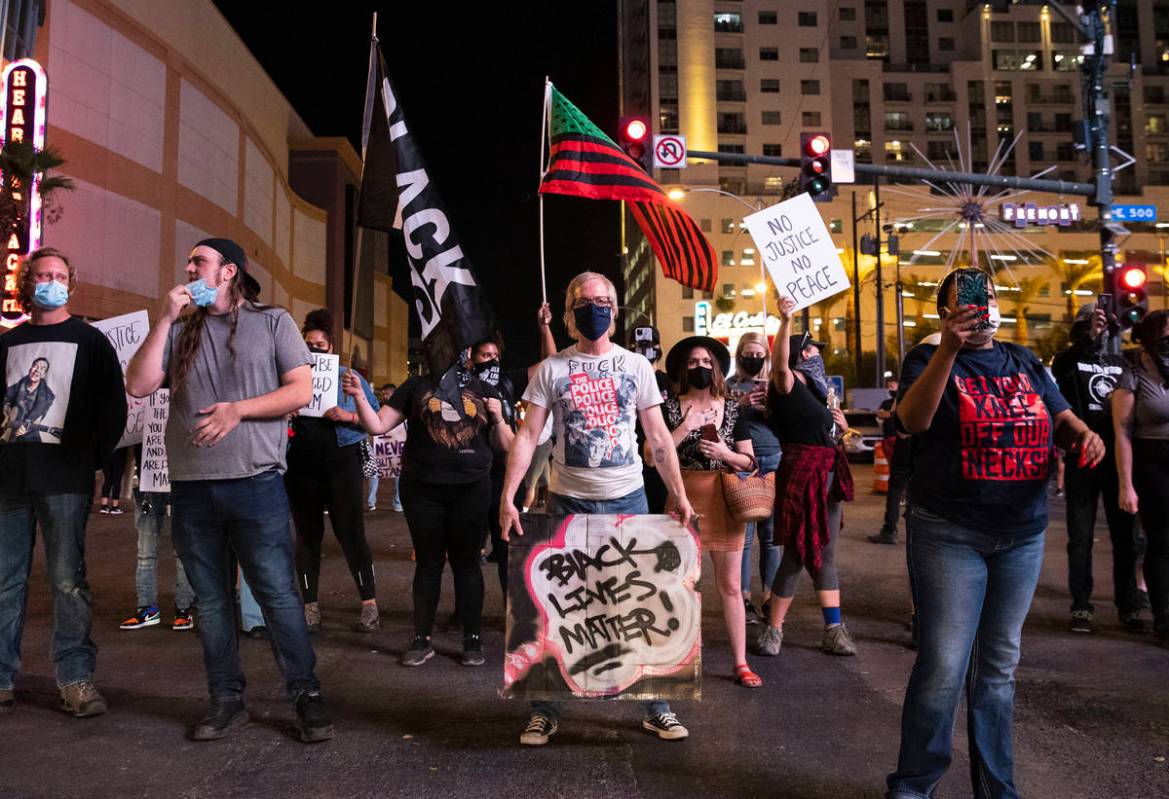 Protesters, calling for justice in the shooting death of Breonna Taylor, block Las Vegas Boulev ...
