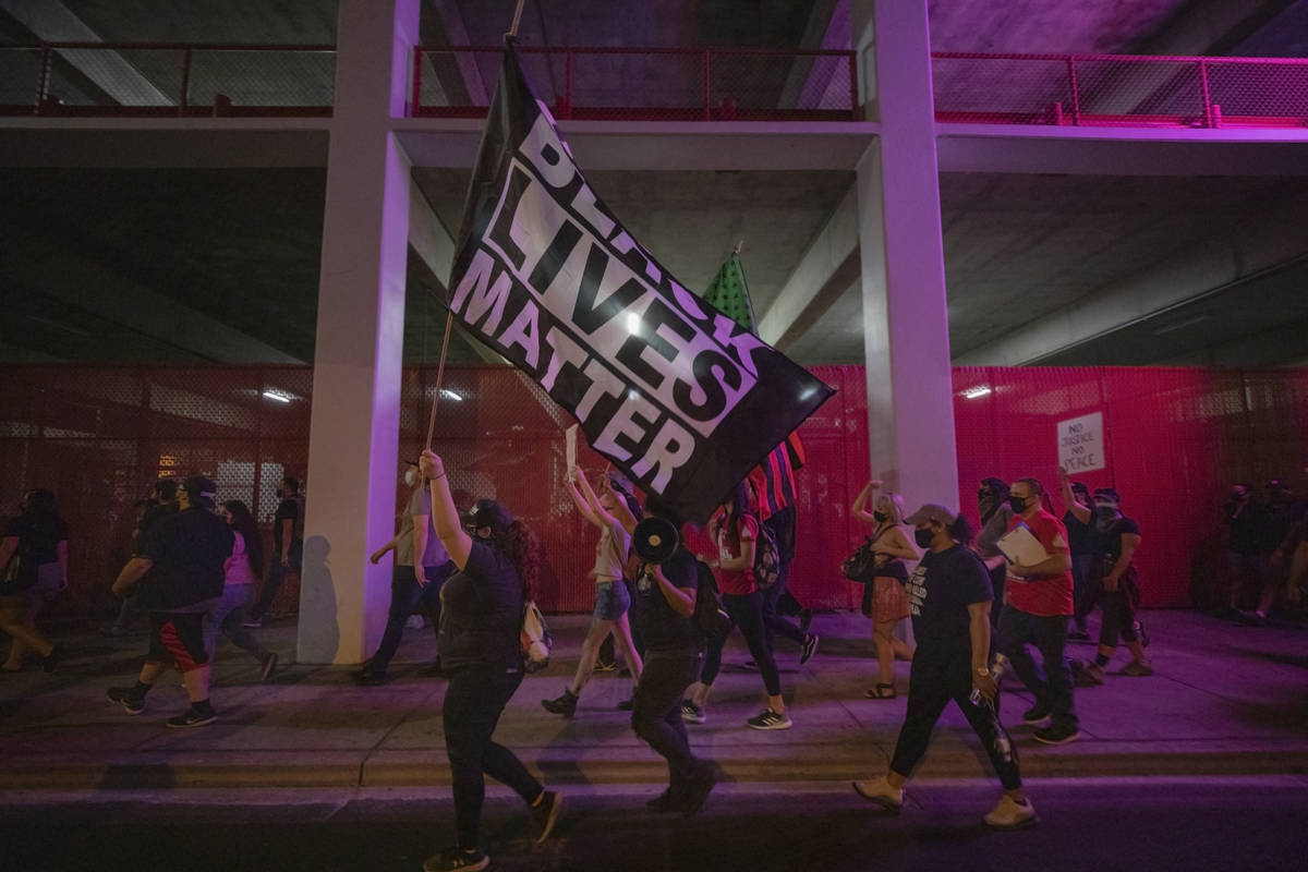 Demonstrators protest on Las Vegas Blvd., in honor of Breonna Taylor in downtown Las Vegas on W ...