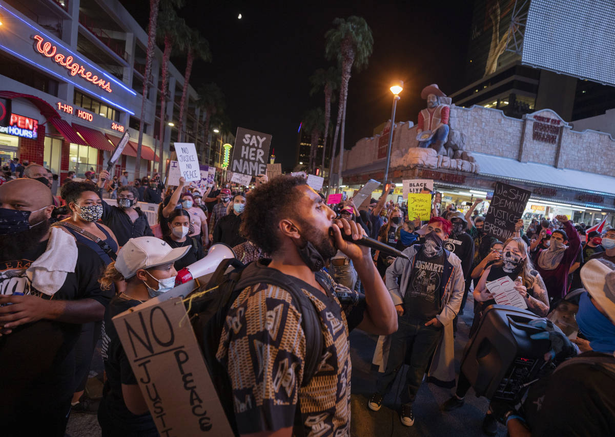 Protester Gary House, 28, of Las Vegas, leads chants in honor of Breonna Taylor on Las Vegas Bl ...