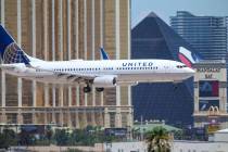 A United Airlines flight prepares to land at McCarran International Airport in Las Vegas. (Rich ...