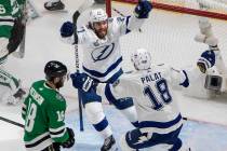 Tampa Bay Lightning center Brayden Point (21) celebrates his goal with Ondrej Palat, right, as ...