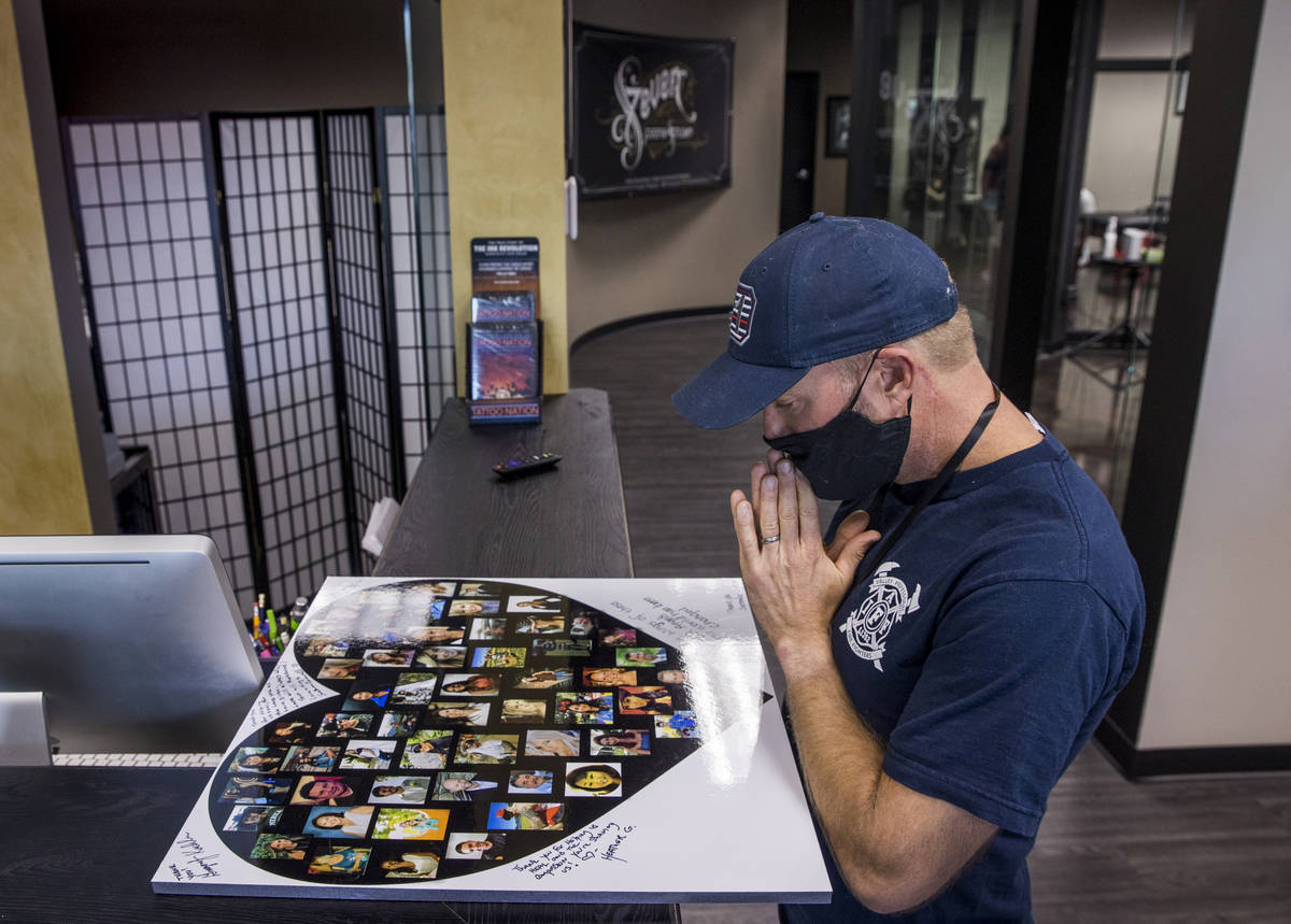 Seattle firefighter Dean McAuley pauses to remember all the victims as Route 91 shooting surviv ...