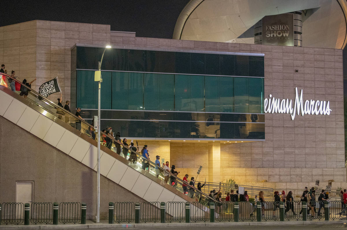 Protesters march to call for justice for Breonna Taylor on the Las Vegas Strip, Thursday, Sept. ...