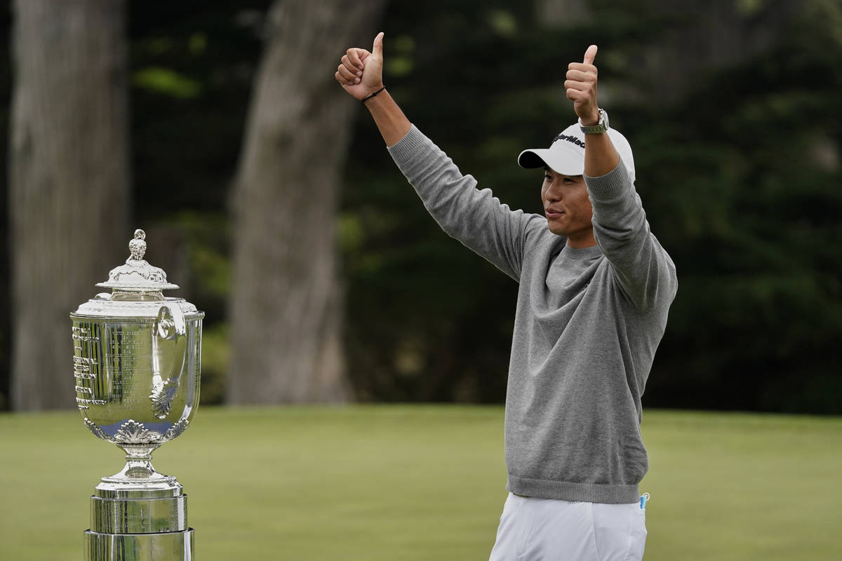 Collin Morikawa poses with the Wanamaker Trophy after winning the PGA Championship golf tournam ...
