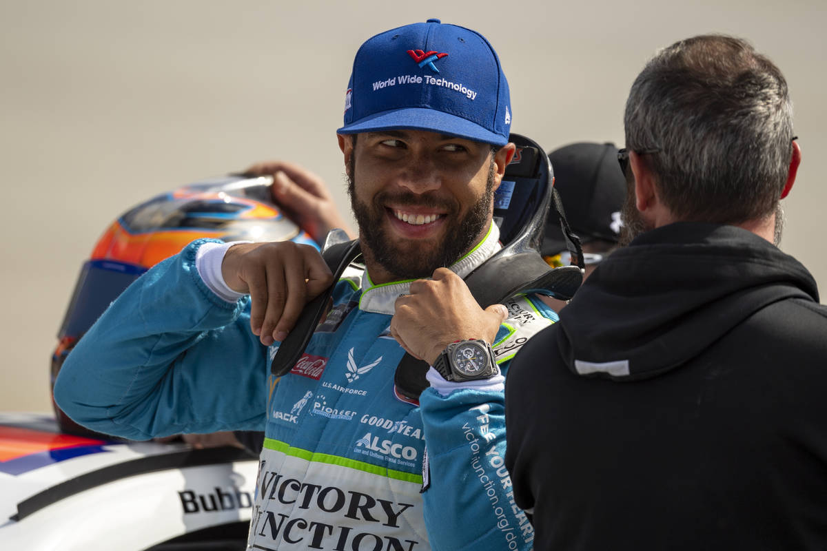 FILE - In this Oct. 5, 2019, file photo, Bubba Wallace gets ready to enter his car for qualifyi ...
