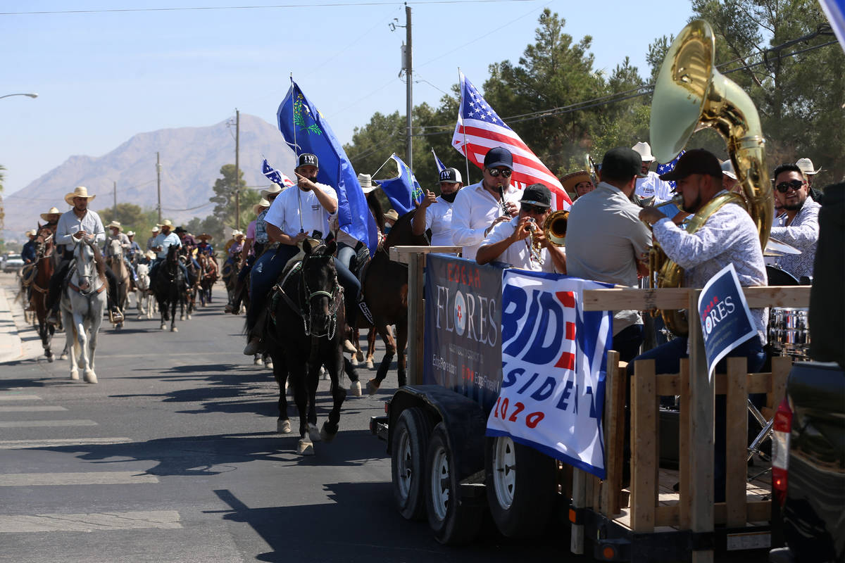 Horseback riders participate in the re-election campaign event for Assemblyman Edgar Flores in ...