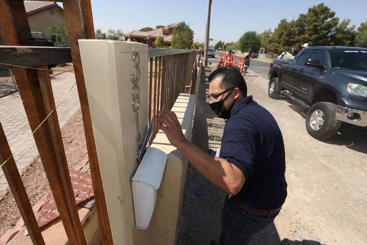 Assemblyman Edgar Flores canvasses in his east Las Vegas neighborhood, Saturday, Sept. 26, 2020 ...