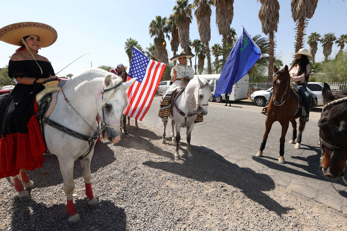 Horseback riders Monica Moran, from left, Karely Lara, and Priscilla Corona, participate in the ...