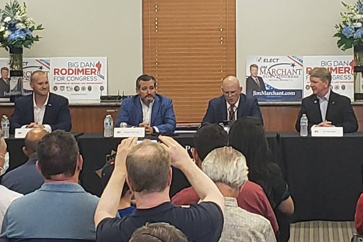 Sen. Ted Cruz, R-Texas, center, campaigns in Las Vegas on Saturday with Republican congressiona ...