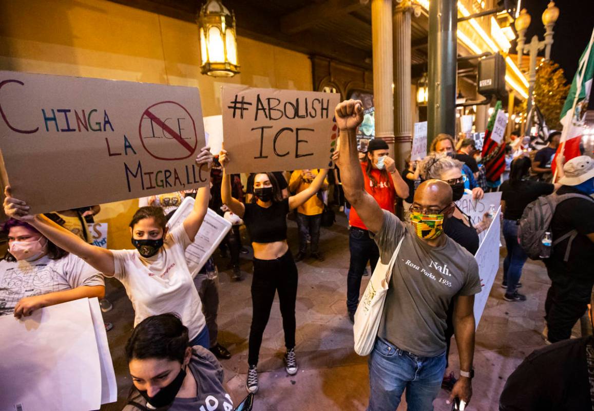 People march during a protest against U.S. Immigration and Customs Enforcement (ICE) in downtow ...