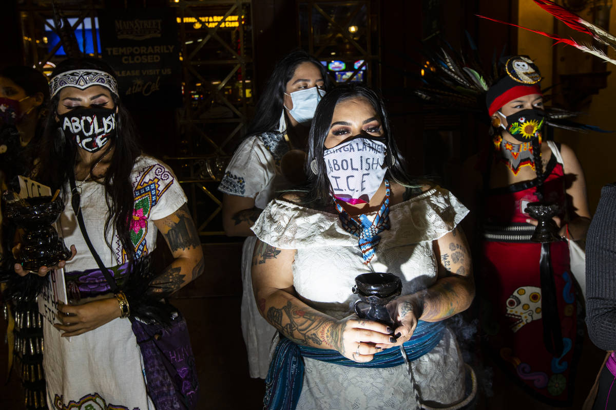 People march during a protest against U.S. Immigration and Customs Enforcement (ICE) in downtow ...