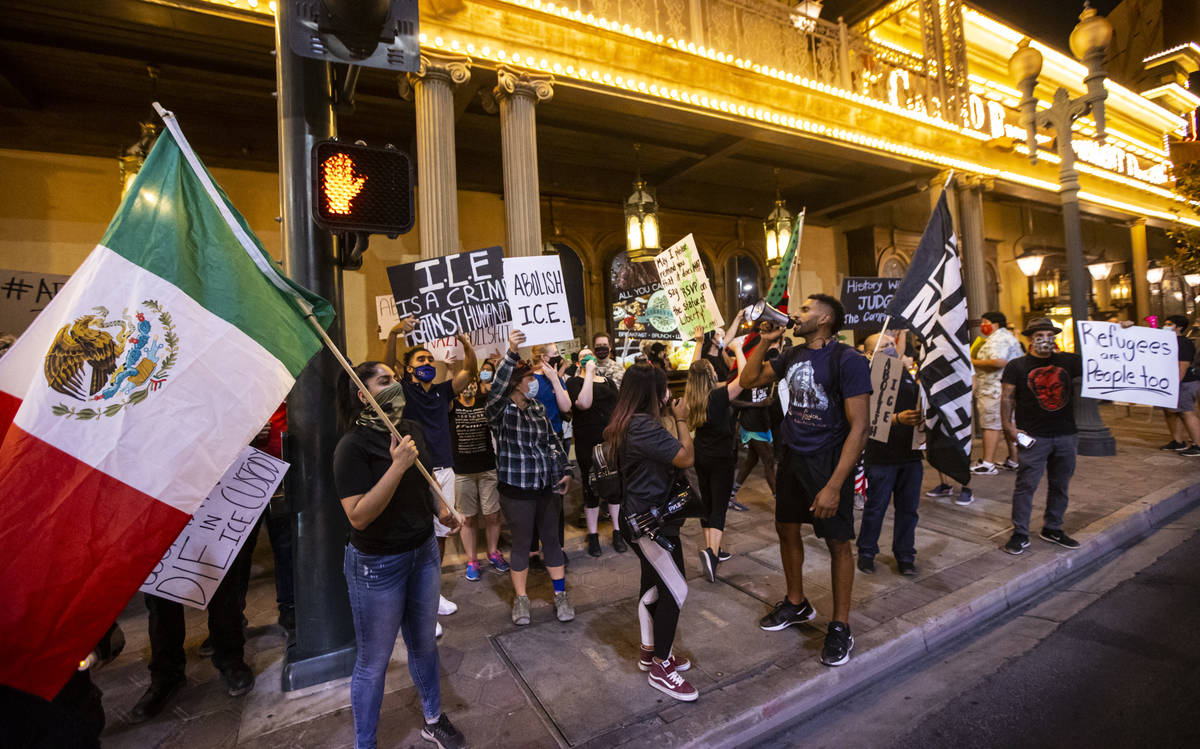 People march during a protest against U.S. Immigration and Customs Enforcement (ICE) in downtow ...