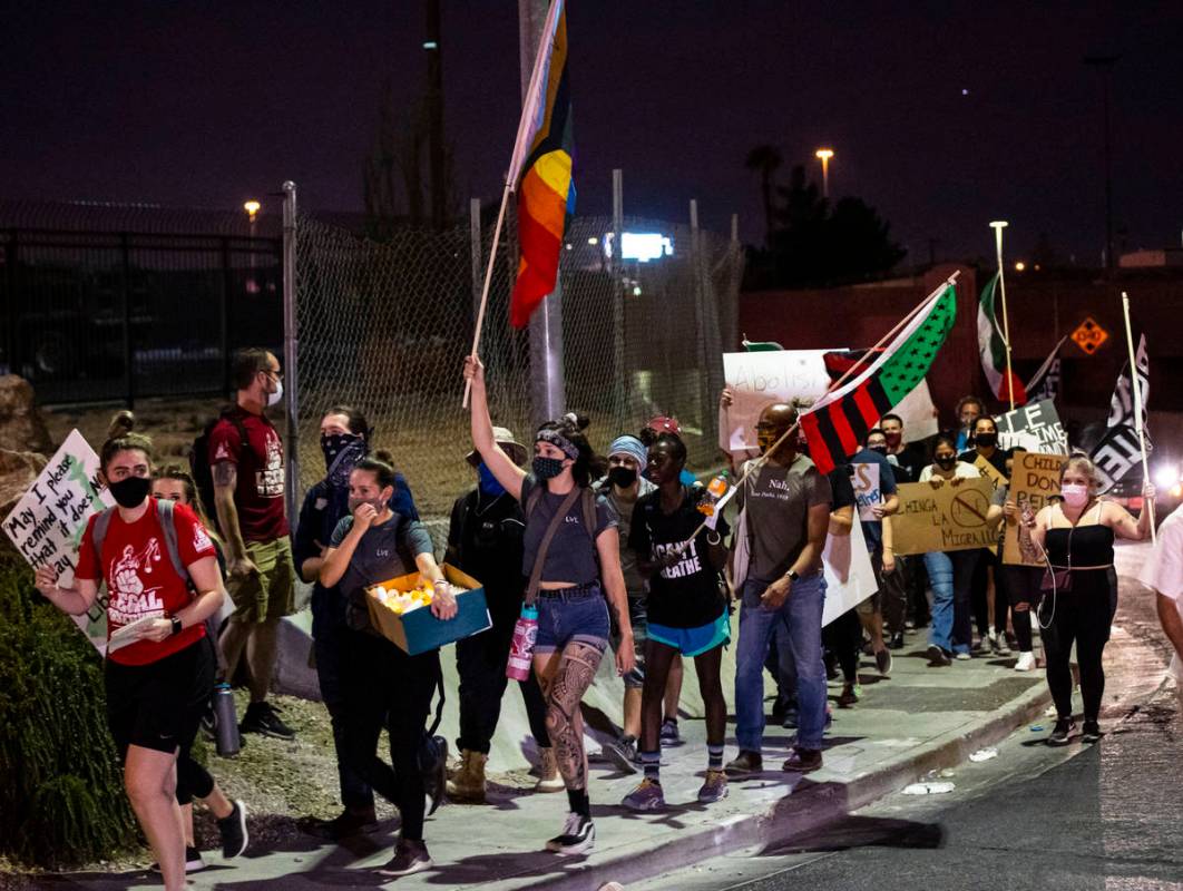 People march during a protest against U.S. Immigration and Customs Enforcement (ICE) in downtow ...