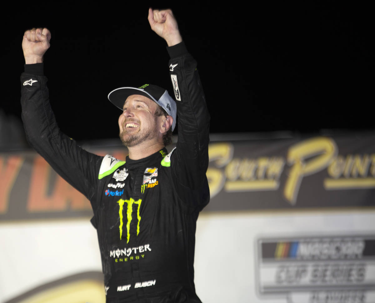 Kurt Busch (1), of Las Vegas, celebrates in Victory Lane after winning a NASCAR Cup Series auto ...