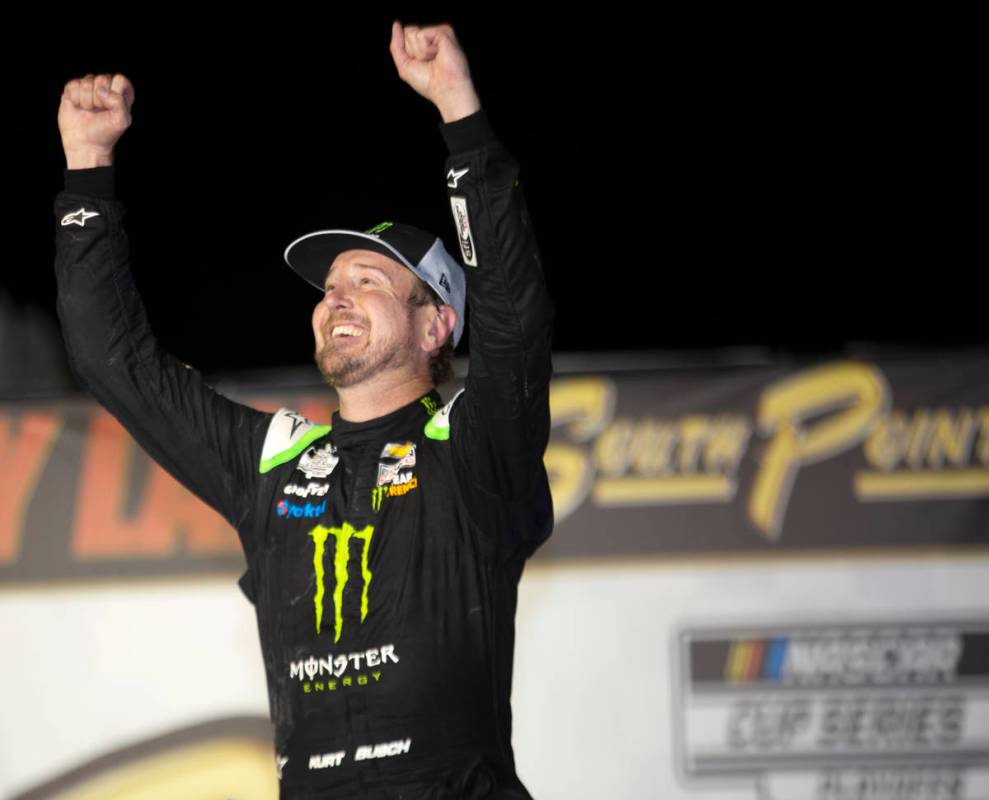 Kurt Busch (1), of Las Vegas, celebrates in Victory Lane after winning a NASCAR Cup Series auto ...