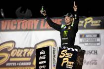 Kurt Busch (1), of Las Vegas, celebrates in Victory Lane after winning a NASCAR Cup Series auto ...