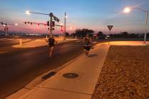 Christina Gruber and James Bristow were the first ones to finish the 5K. (Alex Chhith Las Vegas ...
