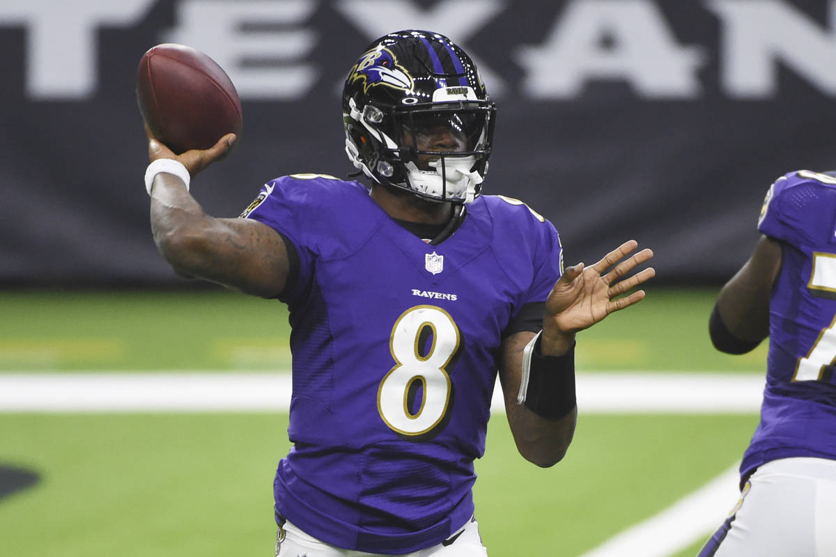 Baltimore Ravens quarterback Lamar Jackson (8) throws against the Houston Texans during the fir ...