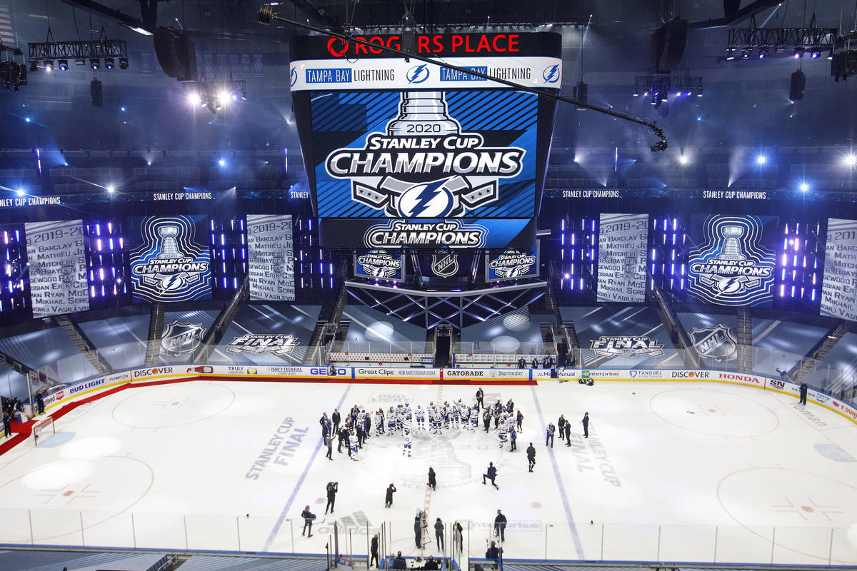 Tampa Bay Lightning players celebrate after defeating the Dallas Stars to win the Stanley Cup i ...