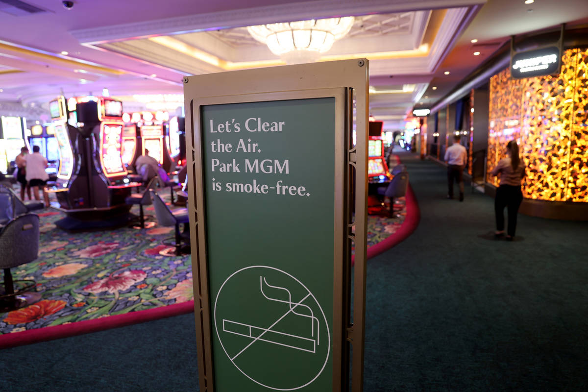 A sign informs guests about the new smoke-free policy as Park MGM reopens after the coronavirus ...