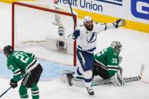 Tampa Bay Lightning's Pat Maroon (14) watches the puck go in past Dallas Stars' goalie Anton Kh ...