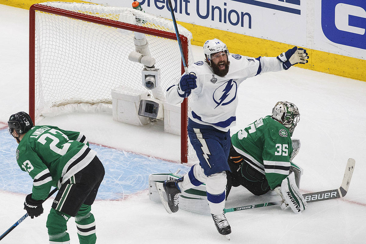 Tampa Bay Lightning's Pat Maroon (14) reacts as the puck goes in past Dallas Stars' goalie Anto ...