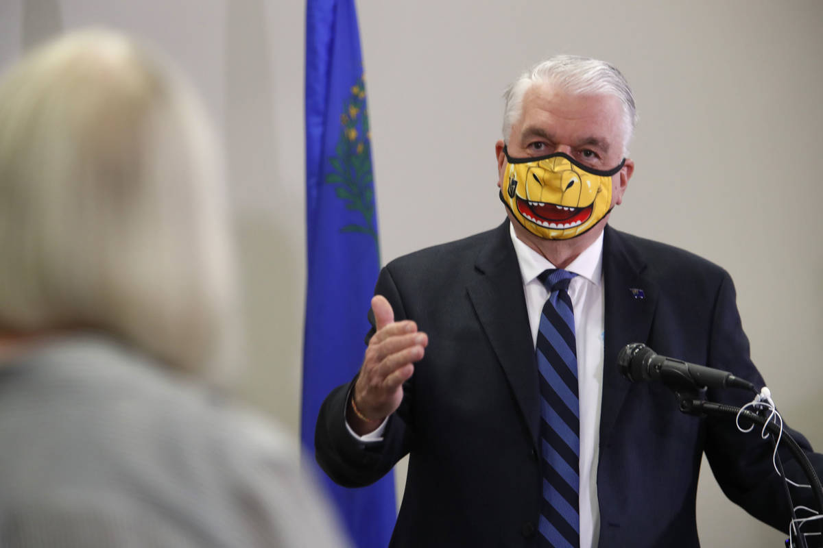 Nevada Governor Steve Sisolak responds to a question during a news conference at the Grant Sawy ...