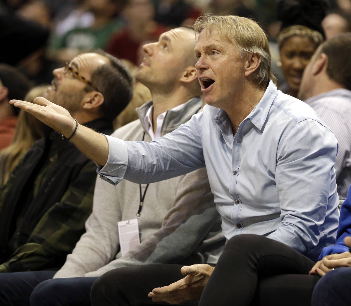Milwaukee Bucks co-owner Wes Edens reacts to a call during the second half of an NBA basketball ...
