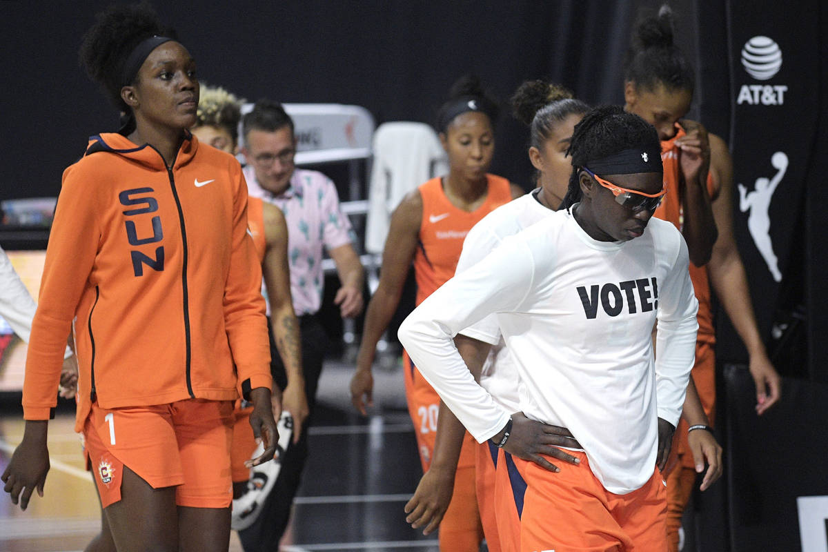 Connecticut Sun players leave the court after losing to the Las Vegas Aces in Game 5 of a WNBA ...