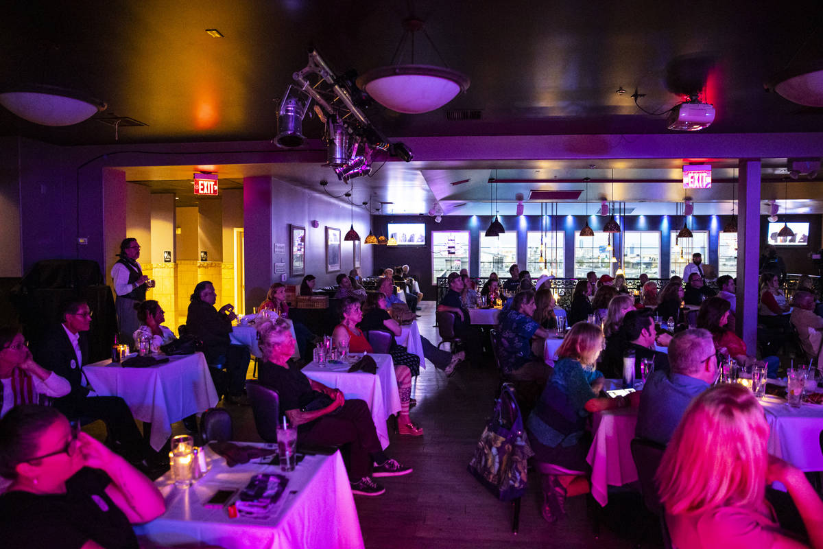 Supporters of President Donald Trump cheer during a debate watch party at Rhythm Kitchen in Las ...