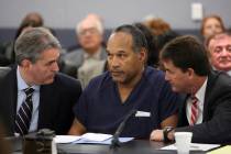O.J. Simpson appears in court with attorneys Gabriel Grasso, left, and Yale Galanter prior to h ...