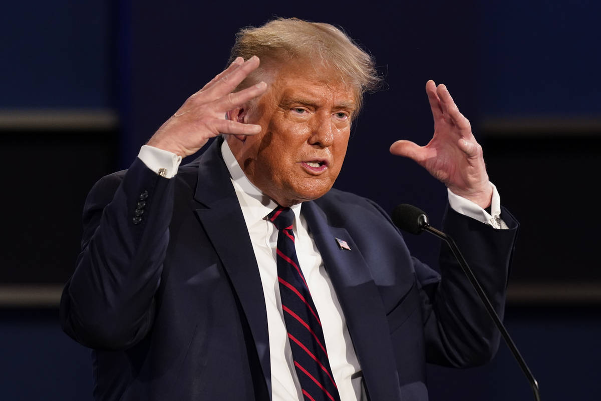 President Donald Trump gestures while speaking during the first presidential debate Tuesday, Se ...