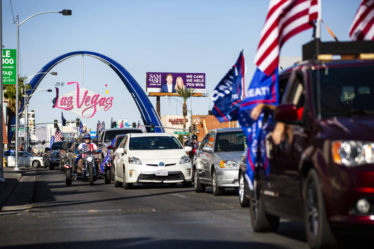 People participate in a parade in support of law enforcement and President Donald Trump in Las ...