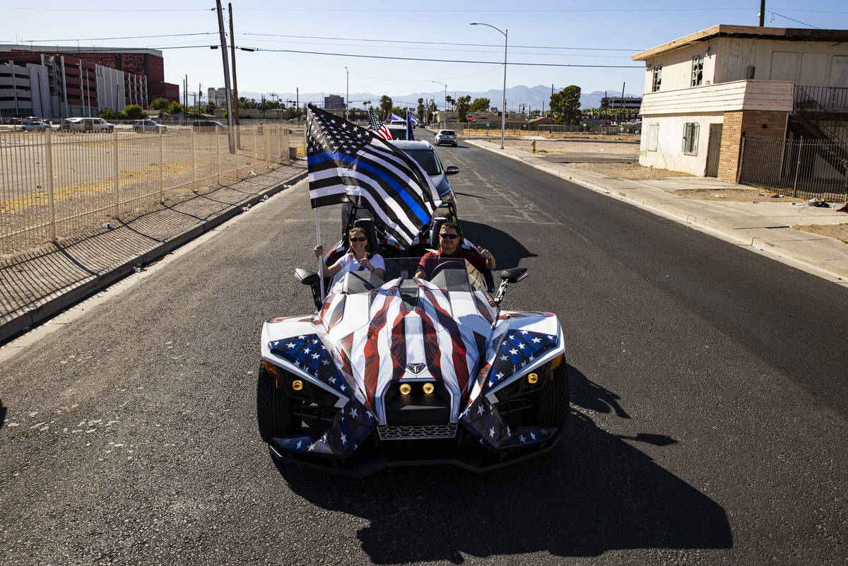 People participate in a parade in support of law enforcement and President Donald Trump in Las ...