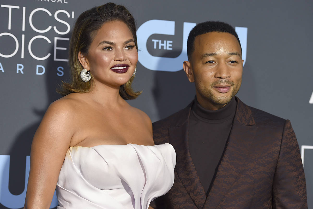 Chrissy Teigen, left, and John Legend arrive at the 24th annual Critics' Choice Awards on Jan. ...